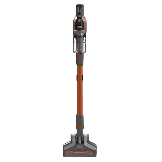 Un aspirateur balai sans fil BLACK+DECKER, modèle BHFEV182B, placé debout et vu de face. L'aspirateur présente un design orange et noir avec un réservoir à poussière transparent.